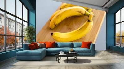 banana bunch close up on the kitchen table Wall mural