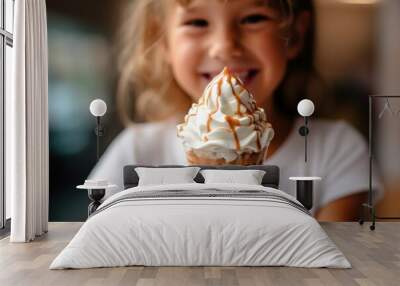 Smiling, happy, laughing, Little girl wearing white t-shirt, holding a sundae in her hand Wall mural