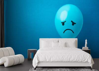 Stock photo of a blue monday balloon on a blue background Wall mural