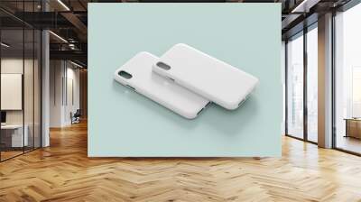 Two smartphone case mockup, blank cover template isolated on a neutral color background. White cellphone plastic protector for branding design presentation Wall mural