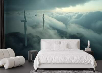 A wind farm is shown in the sky with a cloudy day Wall mural