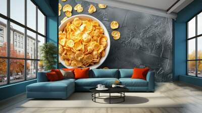 White bowl of cornflakes on a textured dark background. Wall mural