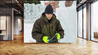 Portrait of an assembler with a tape measure in the hands of Wall mural