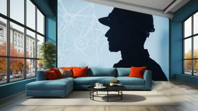 A silhouette of a worker in a hard hat, set against a digital background, symbolizing technology and innovation in the construction or engineering sector. Wall mural