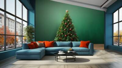 Christmas tree over green background. Backdrop with copy space Wall mural