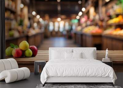 Fruits on a wooden table with blur fruit shop background Wall mural