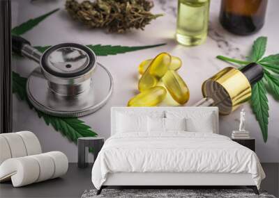 Assorted cannabis products, pills and cbd oil over medical prescription sheet - medical marijuana concept Wall mural