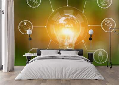 Light bulb Energy saving green nature background Wall mural