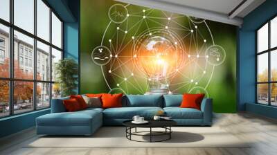 Light bulb Energy saving green nature background Wall mural