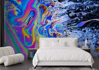 Macro photo of colourful pastel swirly patterns of a soap bubble Wall mural