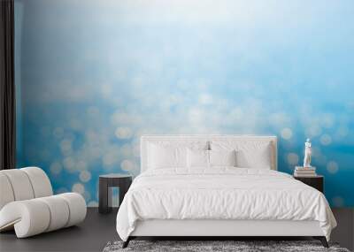 Light bokeh on sea as background. Wall mural