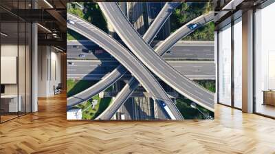 Aerial drone photo of highway multilevel junction interchange crossing road  Wall mural