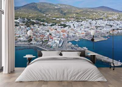 Aerial drone photo of iconic main town and port of Tinos island featuring monastery of Panagia Megalochari (Virgin Mary), Cyclades, Greece Wall mural