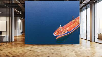 Aerial drone ultra wide top down photo of industrial LPG gas tanker ship anchored in deep blue sea Wall mural