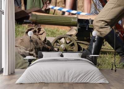 Maxim system machine gun - the most popular machine gun of World War I in dark green coloring during combat Wall mural