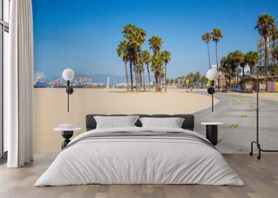 Beautiful morning sunrise lights at the Venice beach in Los Angeles. Bicycle lane by the beach. Wall mural