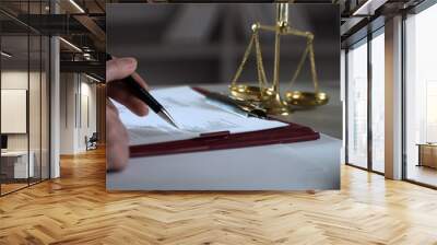  A lawyer working at a desk in a courtroom Wall mural