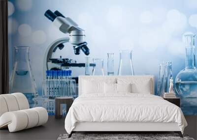 science laboratory research and development concept. microscope with test tubes Wall mural