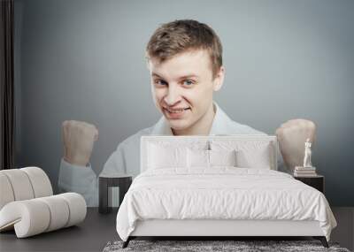 young man celebrating victory Wall mural