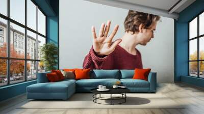 young man saying stop denial gesture Wall mural