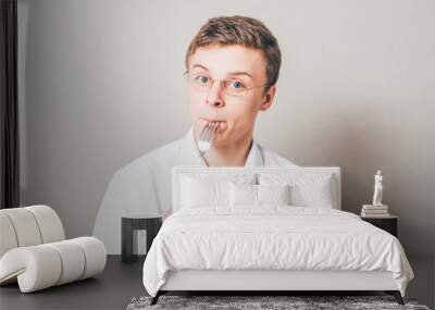 young man with a fork Wall mural