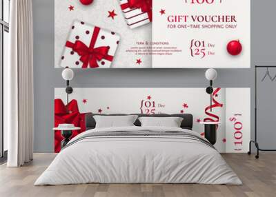 Vector set of elegant Christmas gift vouchers with realistic red bows, gift boxes, toys, ribbons, stars and confetti. Festive background for design of gift cards, coupons and holiday certificates. Wall mural