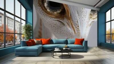 close up of an alien creature with beautiful large eyes, white and gold design  Wall mural