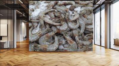 fresh raw shrimps on ice at the fish market Wall mural