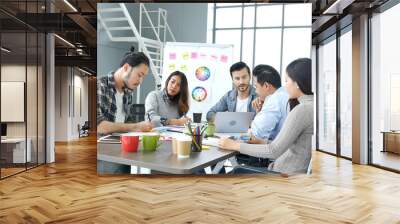 Diversity multiethnic team group of business people meeting in conference room brainstorming with business graph, chart, data info. Teamwork collaborate business team meeting together trust partners Wall mural