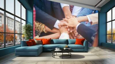 Group of people diversity multiethnic teamwork collaboration team meeting communication  Unified team concept. Business people hands together diversity multiethnic diverse culture partner team meeting Wall mural