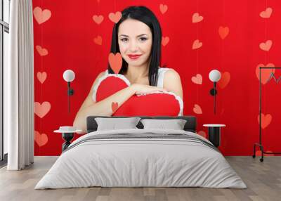 Attractive young woman with heart on Valentine Day Wall mural