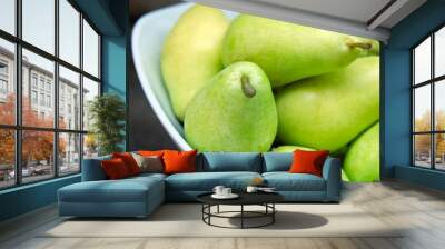 Background of ripe juicy pears, close-up Wall mural