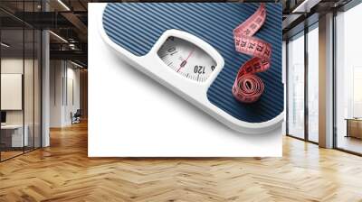 Bathroom scale with measuring tape on white background. Weight loss concept Wall mural