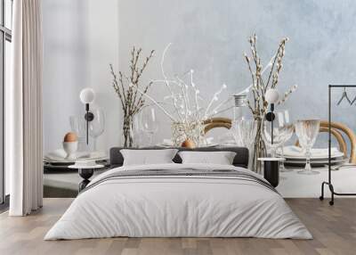 Beautiful Easter table setting in light room Wall mural