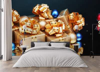 beautiful gifts in gold packaging and christmas balls on blue ba Wall mural