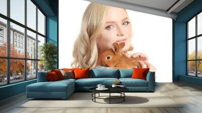 Beautiful girl holding small rabbit on white background Wall mural