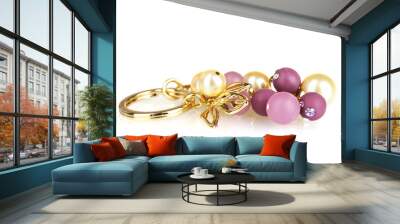 beautiful golden keychain with precious stones isolated on white Wall mural