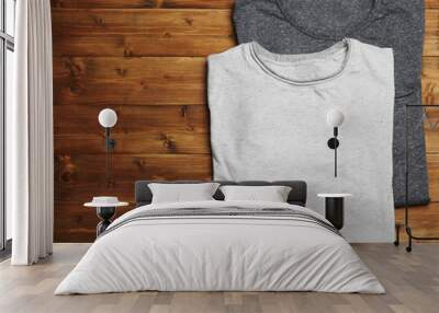 Blank grey t-shirts on wooden background Wall mural