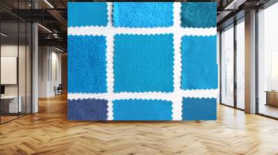 Blue fabric samples on light background Wall mural