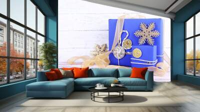 Blue holiday gift boxes and ribbon Wall mural