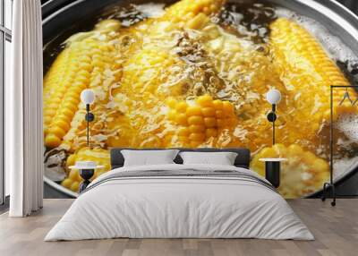 Boiling sweet corn in pan closeup Wall mural