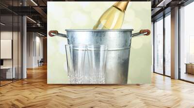 Bottle of champagne in metal ice bucket and two glasses Wall mural