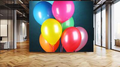 bright balloons on blue background Wall mural