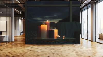 Burning candles on table in dark room Wall mural