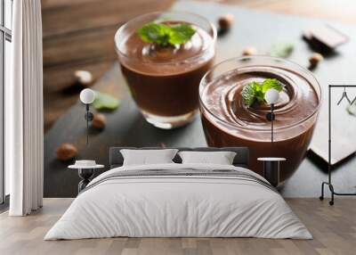 Chocolate mousse with mint in portion glasses on slate cheese board Wall mural