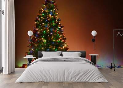 Christmas tree in a dark room Wall mural