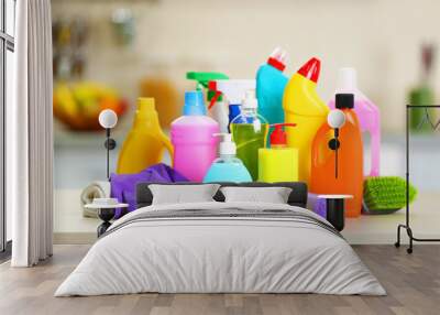 Cleaning set with products and tools on kitchen table Wall mural