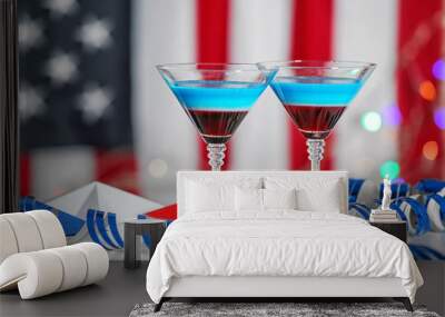 Cocktails in colors of American flag on table against blurred background Wall mural