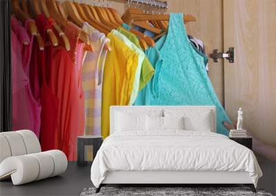 colorful clothes hanging in wardrobe Wall mural