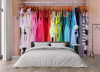 colorful clothes hanging in wardrobe Wall mural